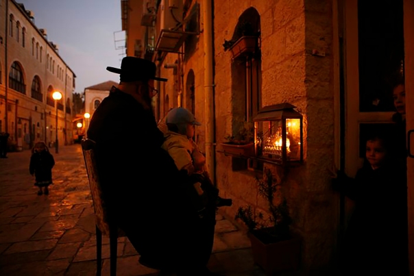 Streets of the Jewish Quarter as the sun sets on Hanukkah.  